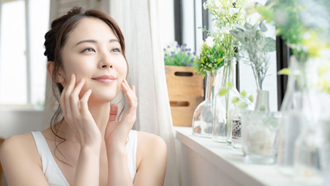 https://bng-sg.b-cdn.net/Ceradan/Woman-touching-her-face-near-window-with-plants-.jpg